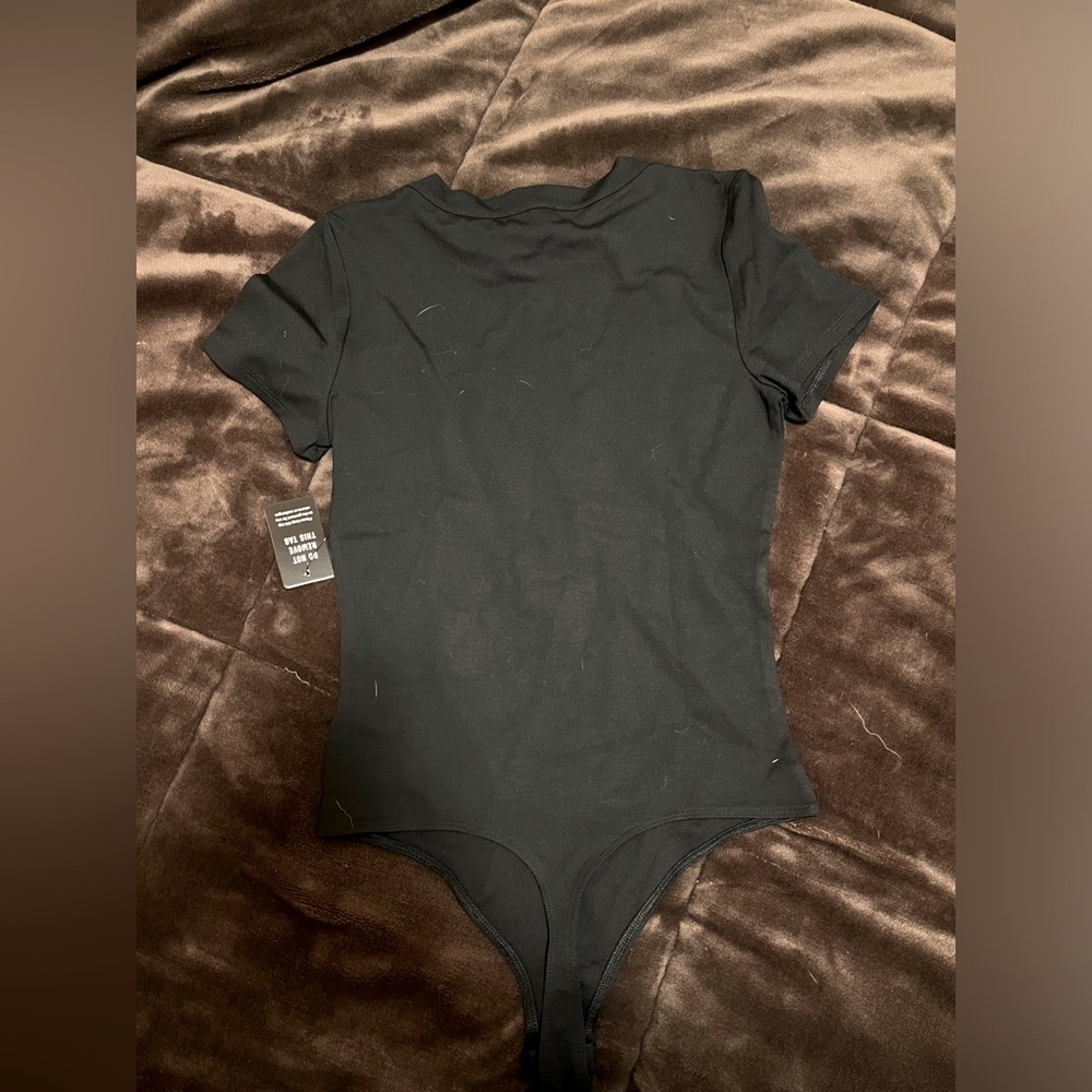 New with tags size small express body suit